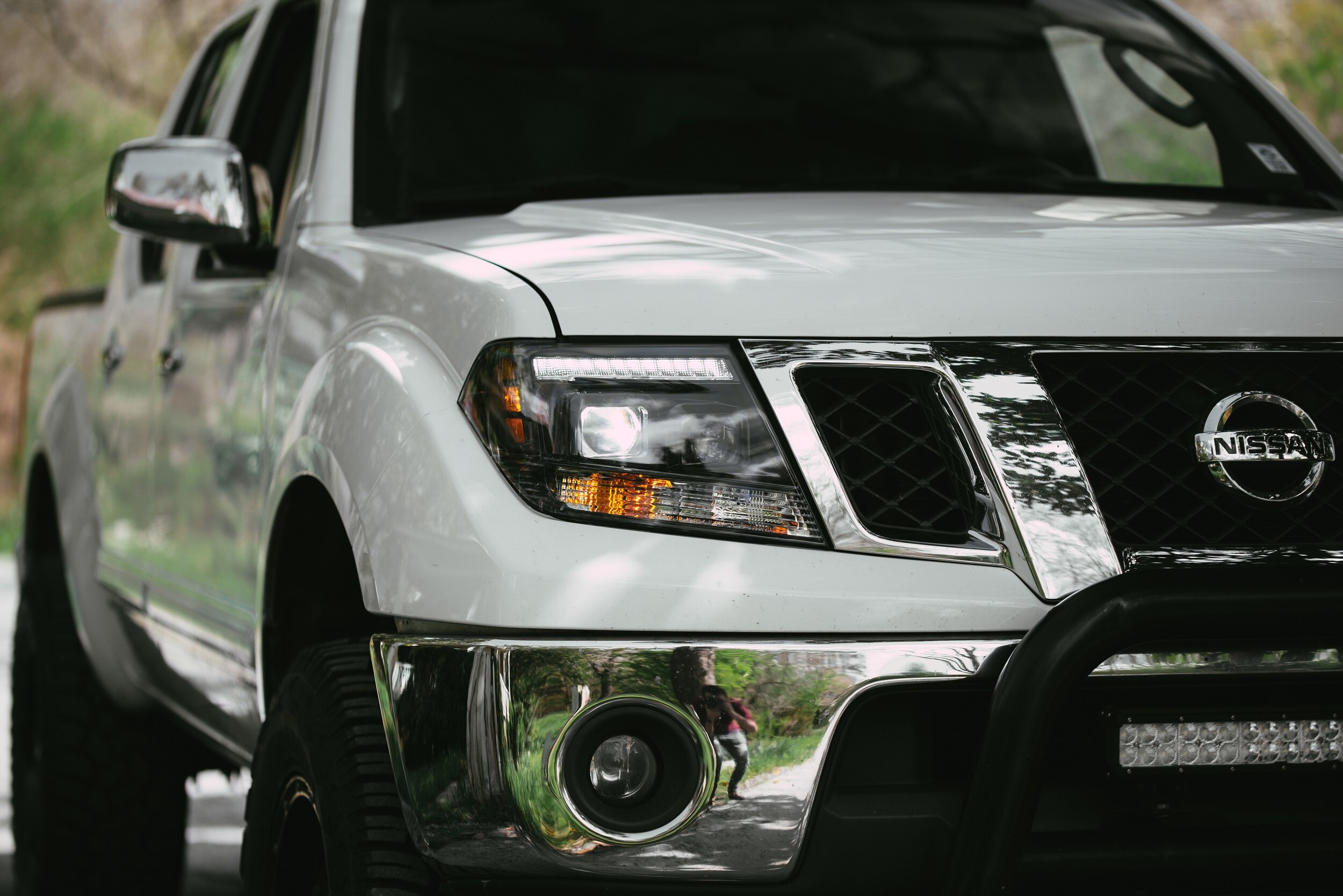 Nissan frontier on sale projector headlights